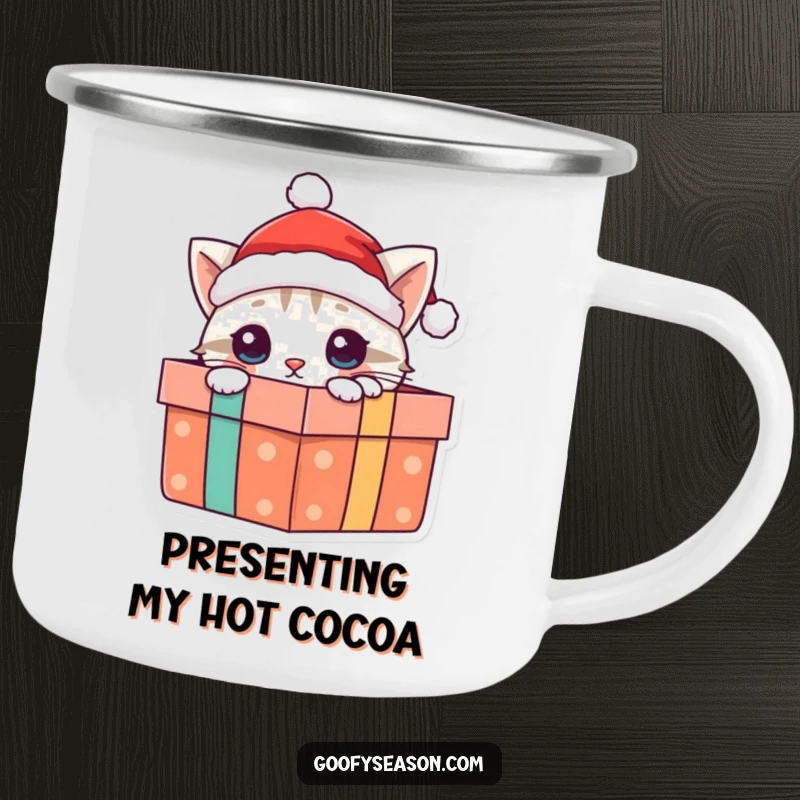 Funny cat camping mug featuring a curious cat with a Santa hat, peeking from a gift box, ideal for outdoor trips.