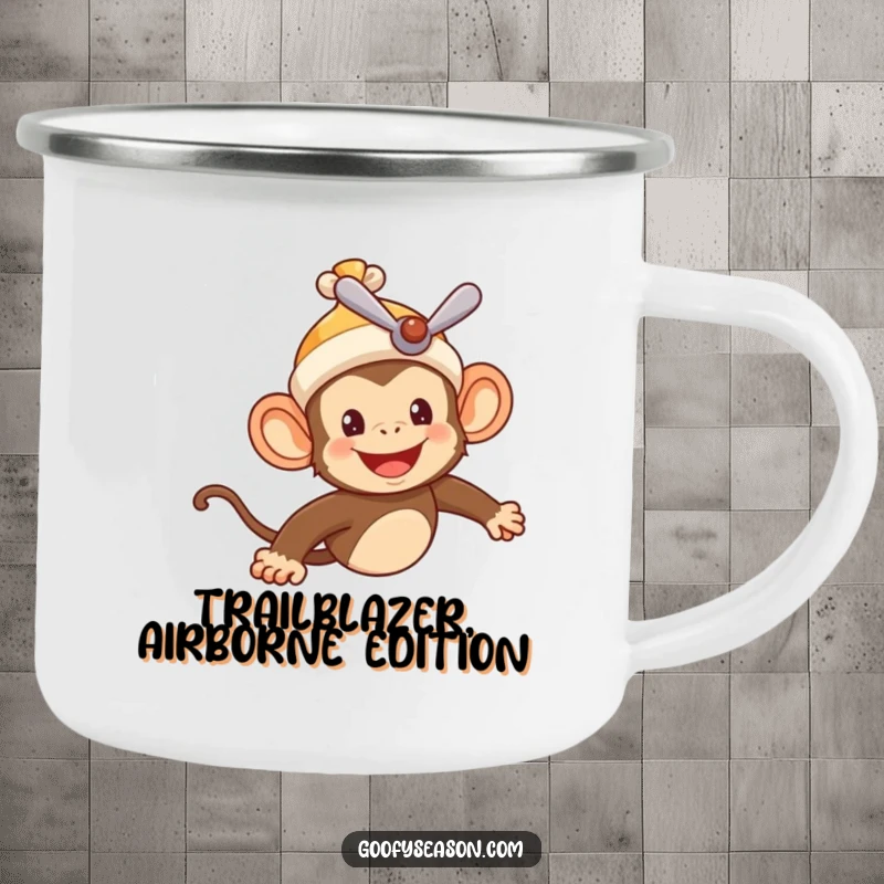 Funny camping mug featuring a cheerful monkey pilot in a propeller beanie, flying through a summer sky, perfect for outdoor adventures.