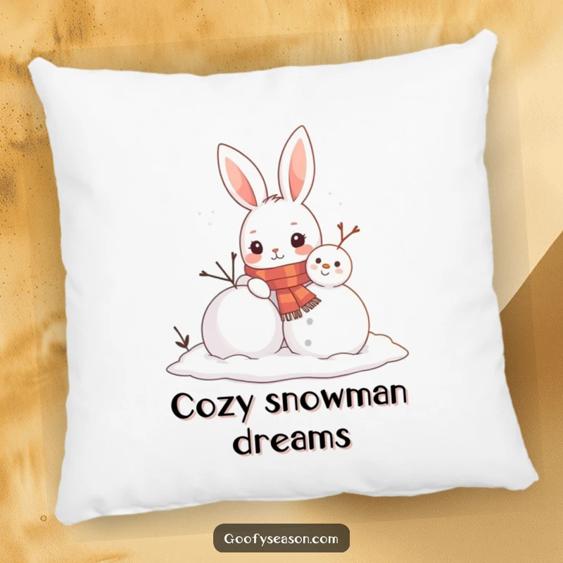 Funny pillow with a curious bunny in a scarf building a snowman, providing comfort and a cheerful winter accent.
