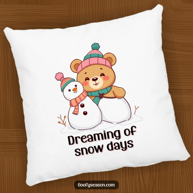 Funny pillow featuring a curious bear character building a snowman, adorned with silly, mismatched hats, bringing cozy humor to any room.