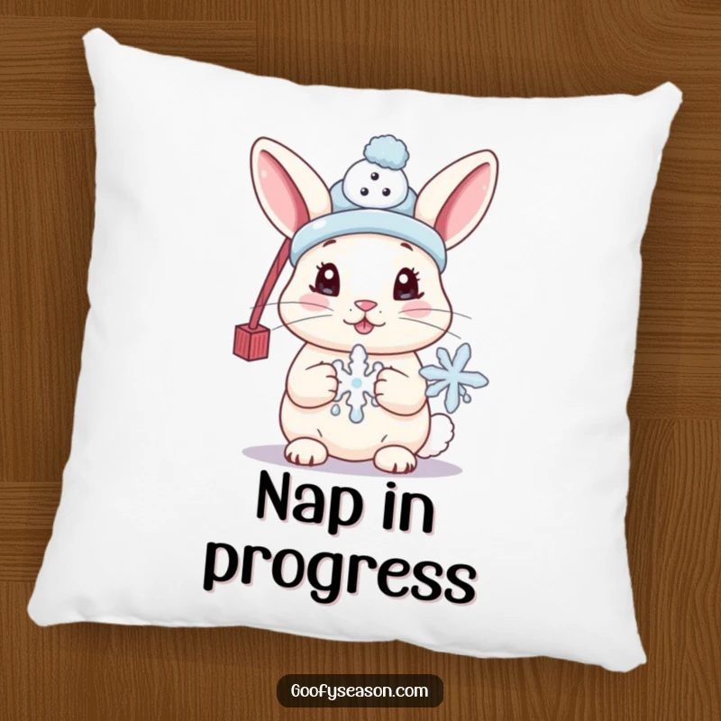 Funny pillow featuring a cute bunny wearing a tiny snowman hat and holding a melting snowflake, offering cozy winter comfort and adorable style.