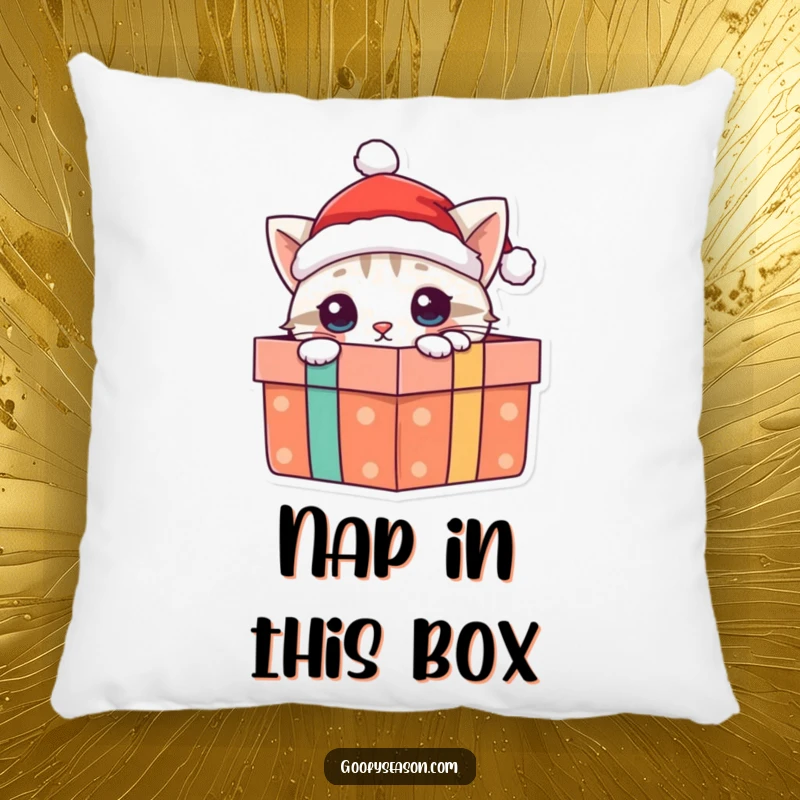 Funny cat pillow design of a curious cat in a Santa hat peeking from a gift box, adding festive comfort and humor.