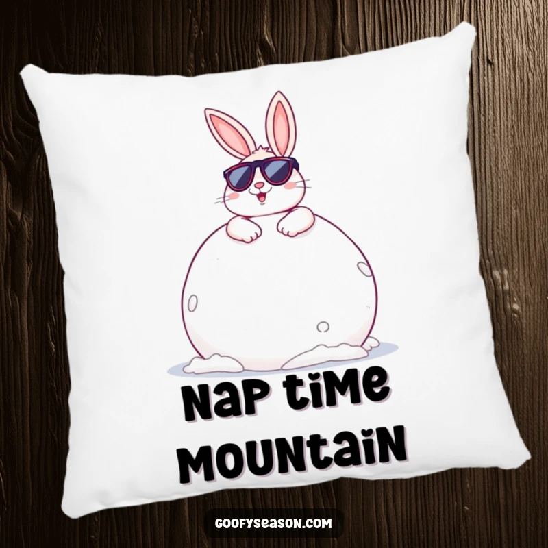 Funny Bunny Pillow: A cheerful bunny wearing sunglasses, lounging on a giant snowball, bringing comfort and cool vibes.
