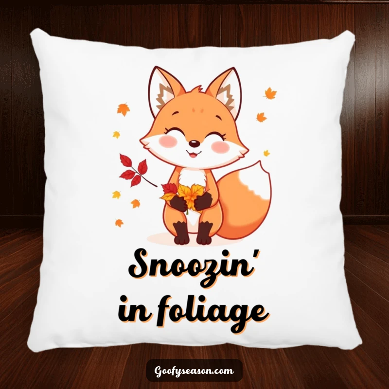 Funny decorative pillow with a cheerful fox character holding colorful autumn leaves, evoking cozy fall feelings.