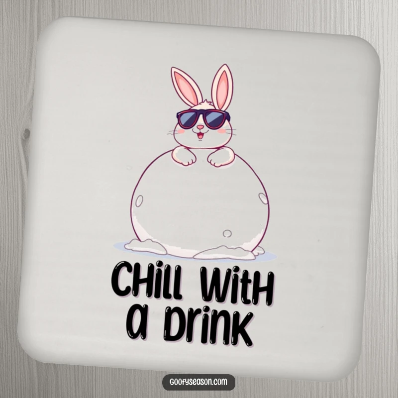 Funny Bunny Drink Coaster: A cheerful bunny wearing sunglasses, lounging on a giant snowball, adding cool whimsy.