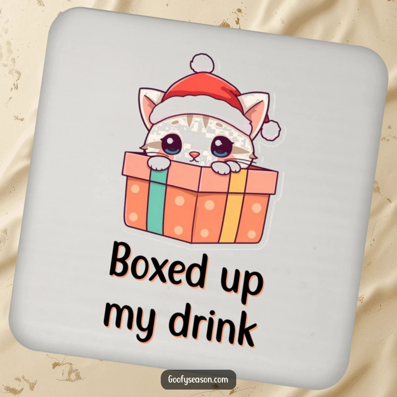 Funny cat coaster art of a curious cat in a Santa hat peeking from a gift box, protecting surfaces with holiday cheer.
