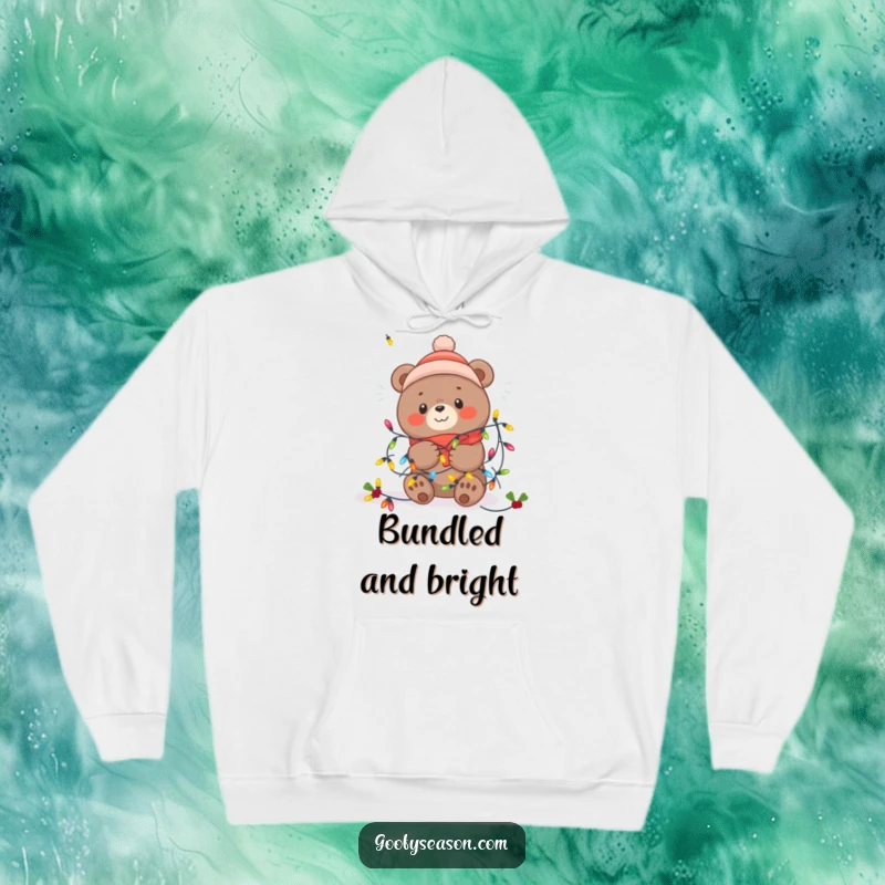 Funny Kawaii bear playfully entangled in glowing festive winter lights, featured on a warm and humorous hoodie.