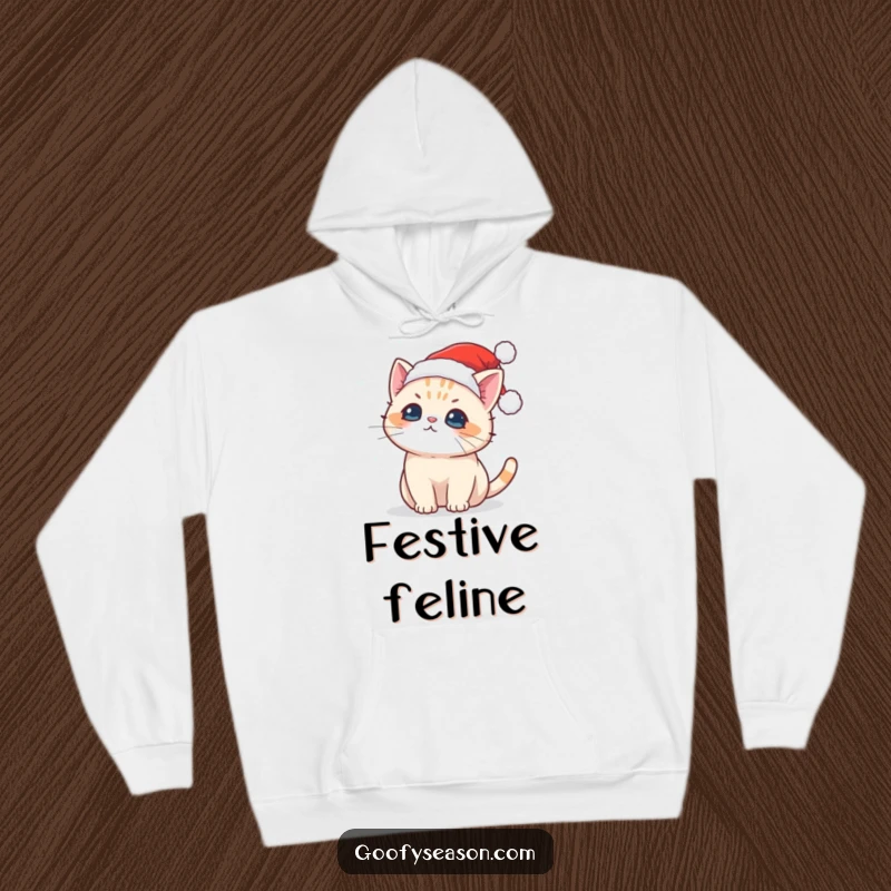 Funny hoodie depicting a cute Kawaii cat in a Santa hat trying to catch falling snowflakes, cozy and festive.
