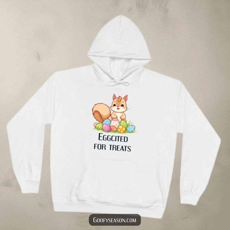 Funny Kawaii squirrel excitedly hiding colorful Easter eggs, featured on a warm and humorous holiday hoodie.