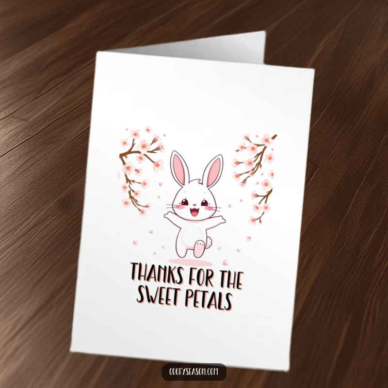 Funny Free Printable Bunny Thank You Card: A cheerful bunny hops happily amid falling cherry blossoms.