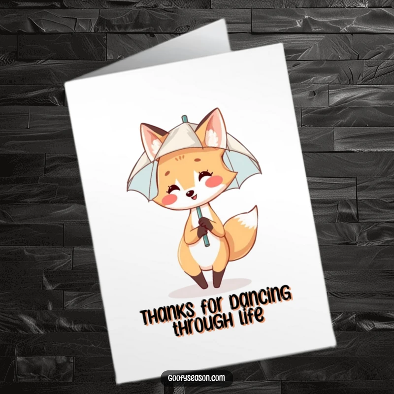 Funny Free Printable Thank You Card: Whimsical fox dancing in rain under umbrella, a charming downloadable art.