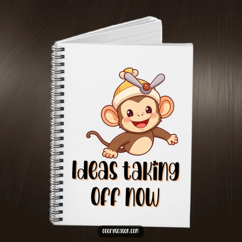 Funny notebook with a cheerful monkey pilot in a propeller beanie, flying through a summer sky, inspiring creative writing.