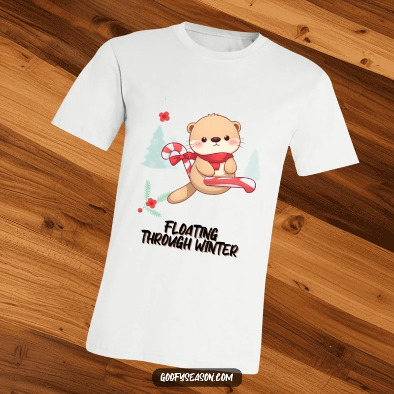 Funny Kawaii otter floating gleefully on a candy cane during winter merriment, printed on a fun t-shirt.