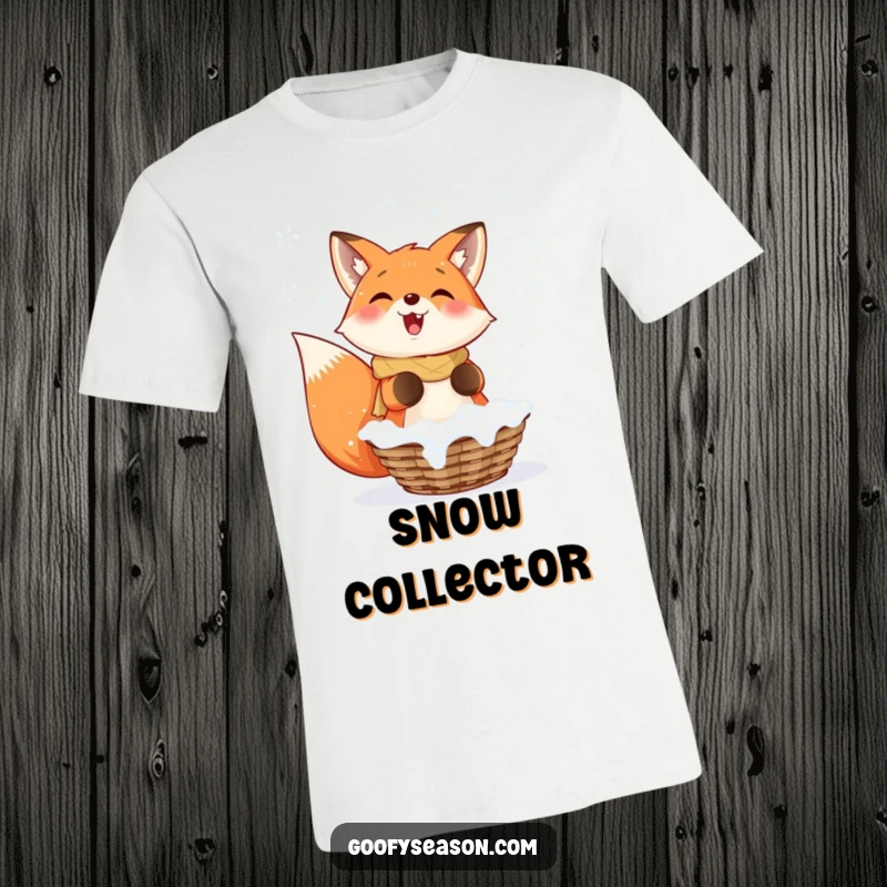Funny Fox T-Shirt: A smiling fox enthusiastically catching falling snowflakes in a basket, embodying winter delight.