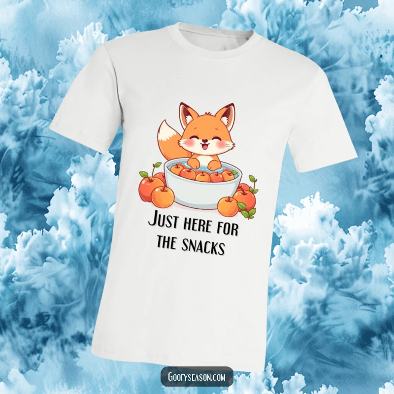 Funny Kawaii fox t-shirt featuring a cute character gleefully bobbing for apples in a big tub, perfect for autumn.