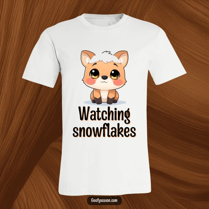 Funny t-shirt design of a curious animal character with wide eyes, peacefully observing a gentle, magical snowfall.
