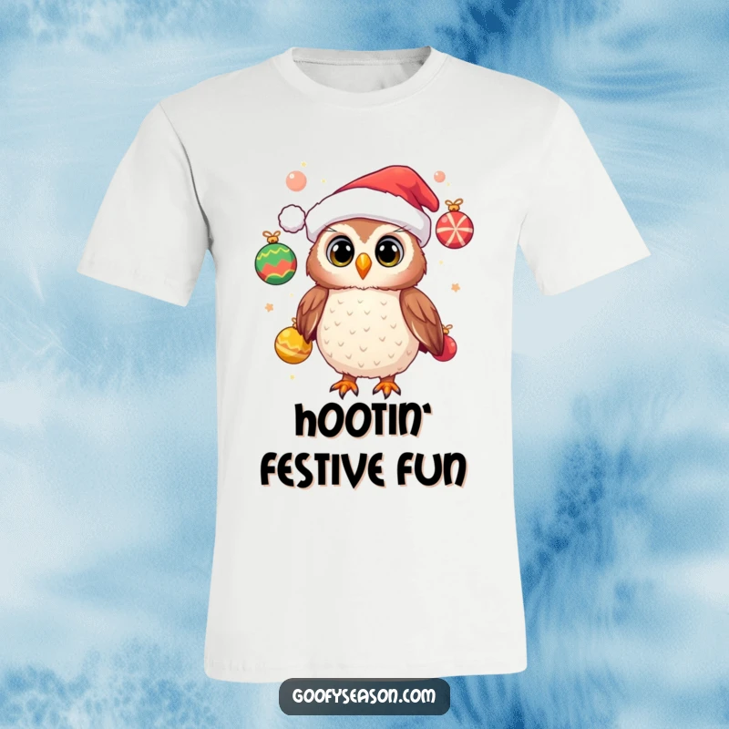 Funny t-shirt with a cheerful owl donning a Santa hat and juggling festive ornaments, celebrating the playful side of the holidays.