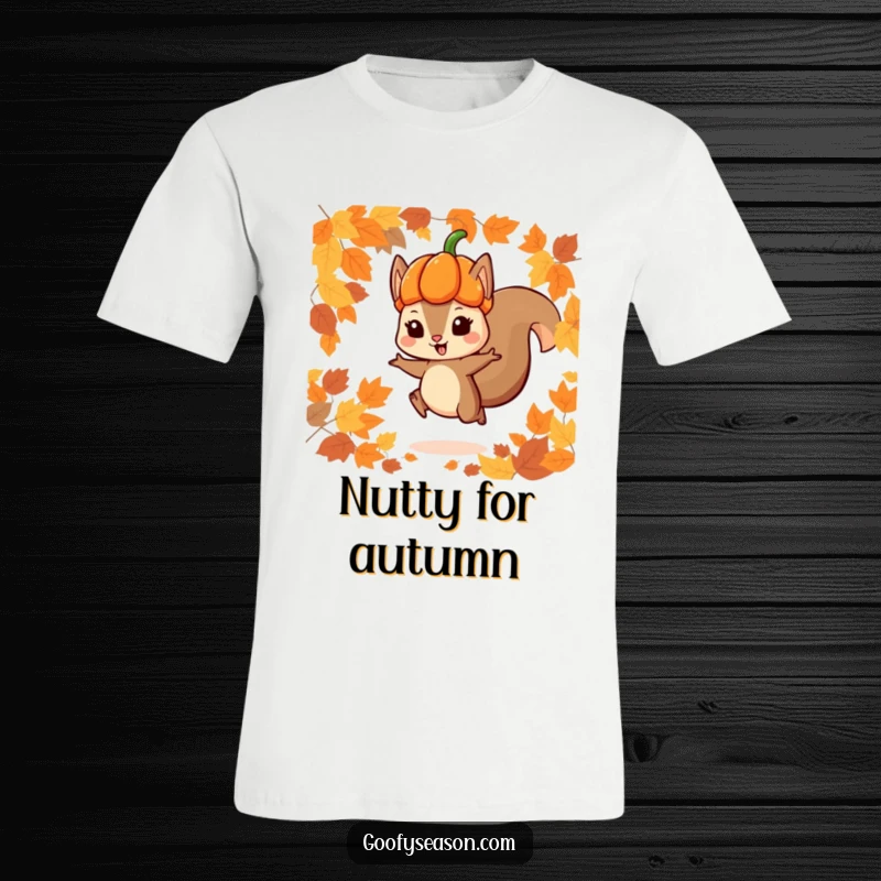 Funny T-Shirt showcasing a playful squirrel wearing a pumpkin hat, leaping enthusiastically through a vibrant carpet of autumn leaves.