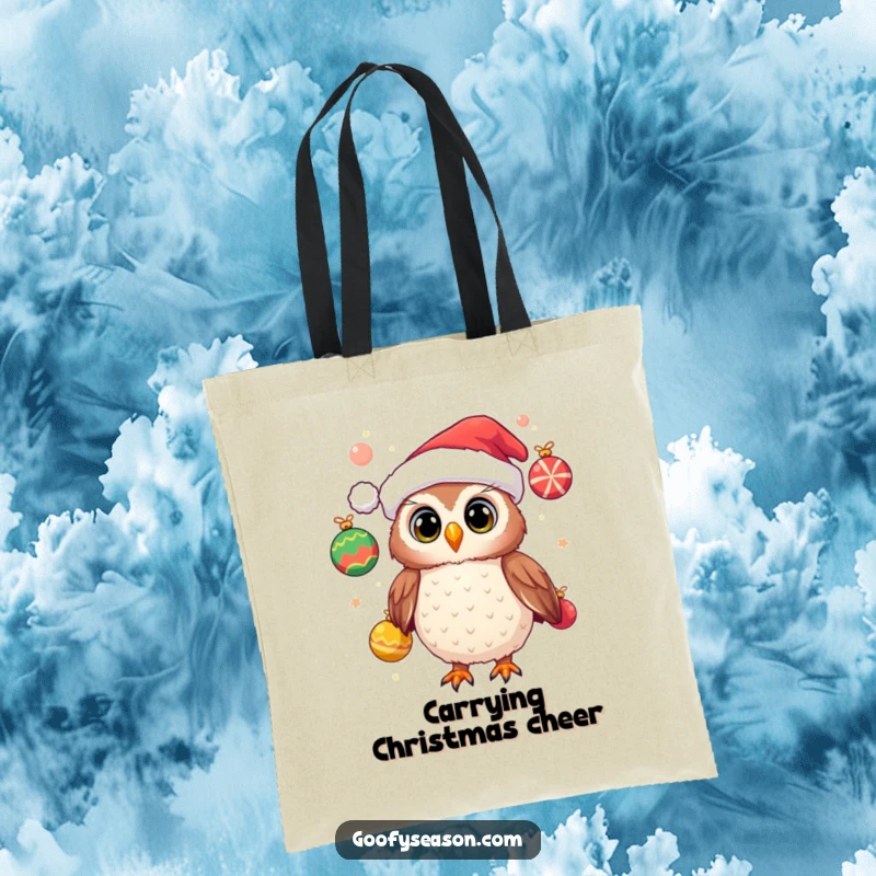 Funny tote bag featuring a cheerful owl wearing a Santa hat and juggling festive ornaments, perfect for holiday shopping and gifts.