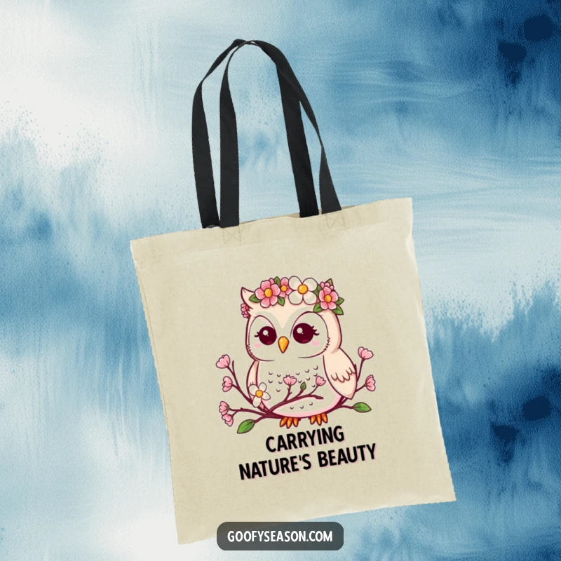 Funny tote bag showcasing a kawaii owl in a flower crown, observing blooming spring buds and flowers.