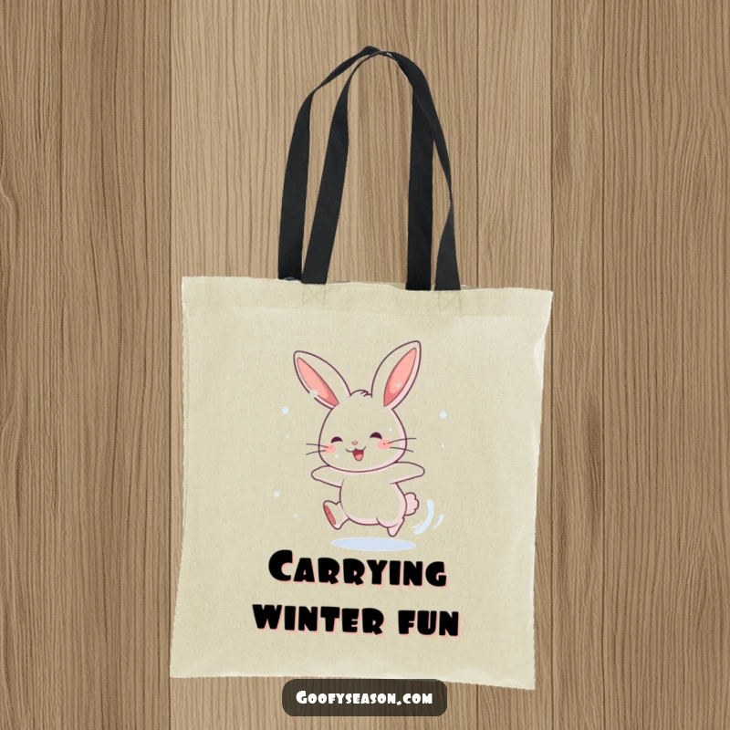Funny tote bag showcasing an energetic rabbit character chasing falling snowflakes, ideal for carrying winter gear with humorous flair.