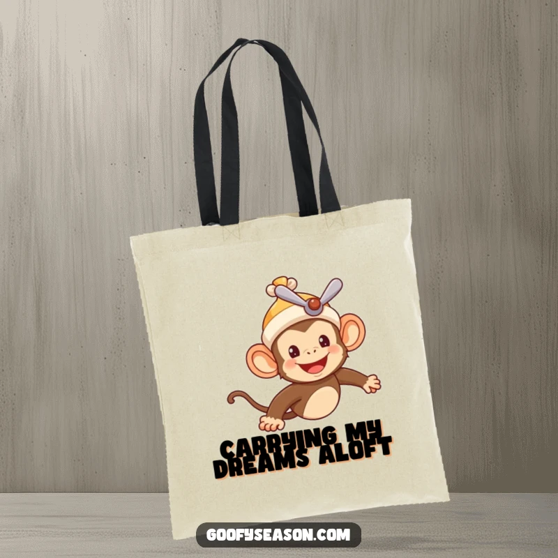Funny tote bag illustrating a cheerful monkey pilot in a propeller beanie, soaring through a summer sky, perfect for carrying joy.