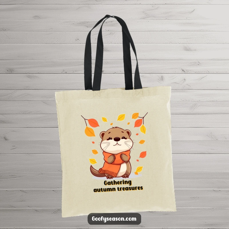 Funny Tote Bag: A curious otter in a scarf watches autumn leaves fall gently.